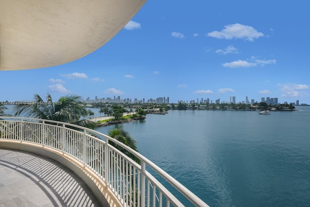 balcony with a city view and a water view