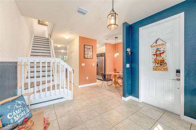 view of tiled foyer