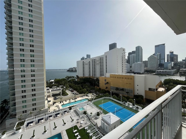 exterior space featuring a city view and a water view