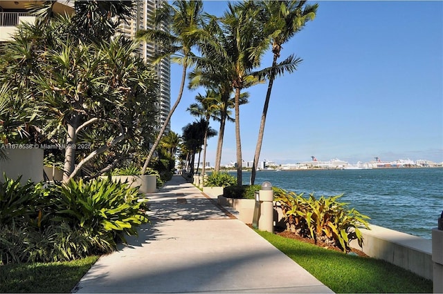 view of home's community with a water view