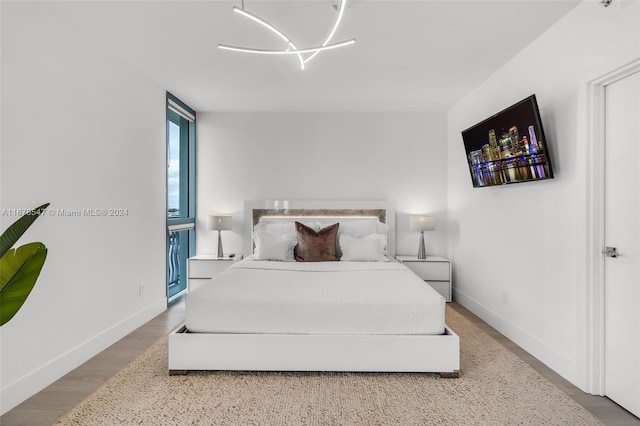 bedroom featuring hardwood / wood-style flooring