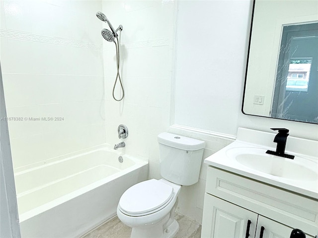 full bathroom with vanity, toilet, and bathing tub / shower combination