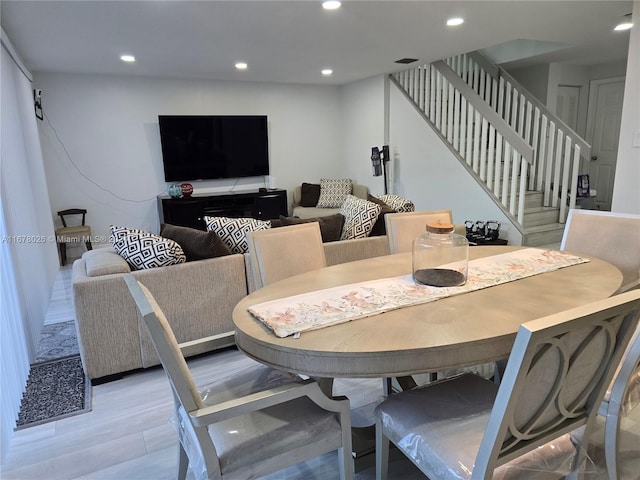 dining room featuring light hardwood / wood-style floors