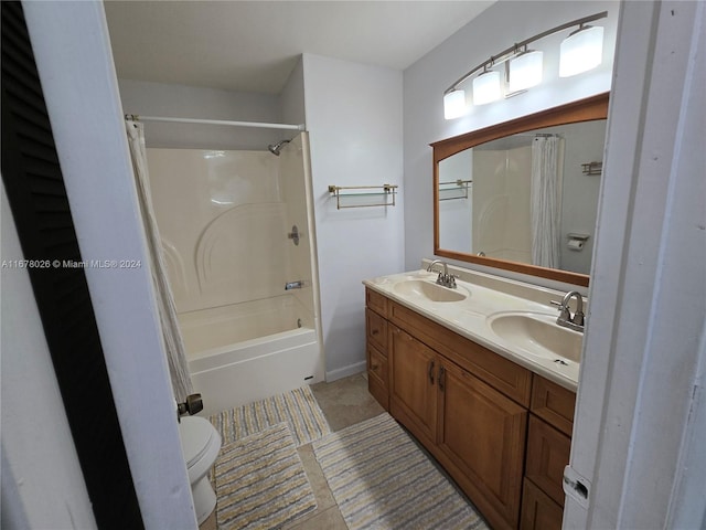 full bathroom featuring vanity, toilet, tile patterned floors, and shower / bath combo with shower curtain