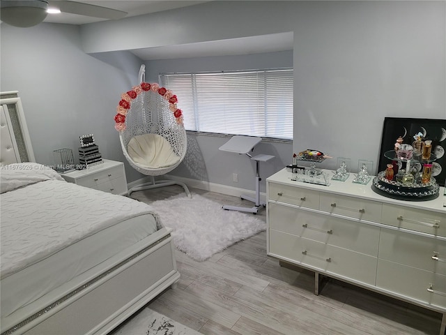 bedroom with light wood-type flooring