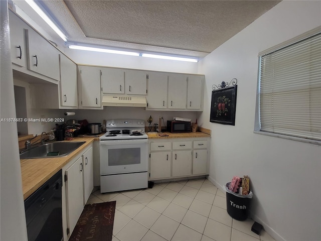 kitchen with sink, black appliances, a textured ceiling, and light tile patterned floors