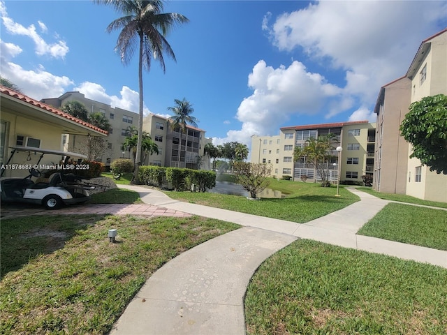 view of community featuring a lawn