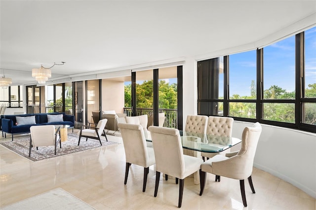 tiled dining area with a notable chandelier and plenty of natural light