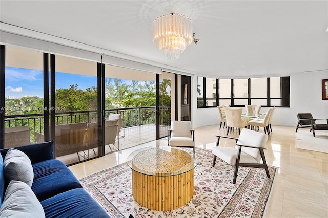 tiled living room with a chandelier