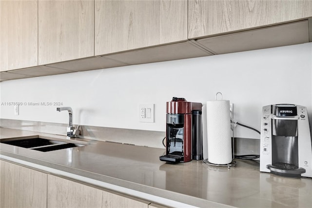 4111 S Ocean Dr Unit 1201, Hollywood, FL 33019 - kitchen featuring light brown cabinetry, a sink, and light countertops