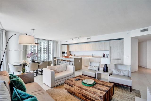 4111 S Ocean Dr Unit 1201, Hollywood, FL 33019 - living area featuring light tile patterned floors and track lighting