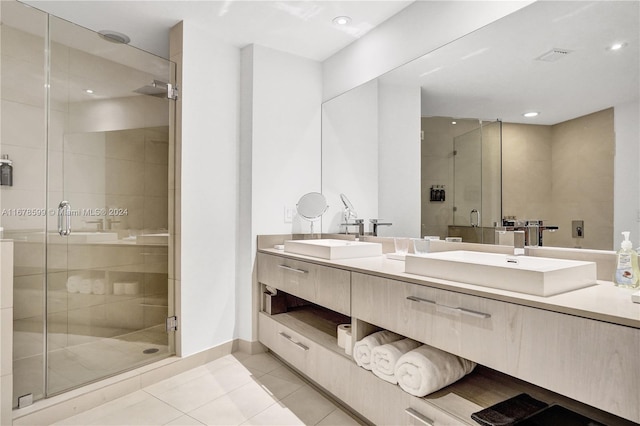 4111 S Ocean Dr Unit 1201, Hollywood, FL 33019 - bathroom featuring tile patterned flooring, a shower stall, double vanity, recessed lighting, and baseboards