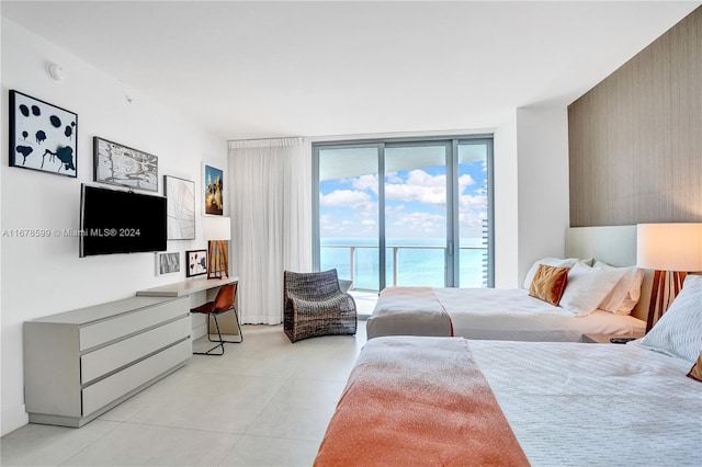 4111 S Ocean Dr Unit 1201, Hollywood, FL 33019 - bedroom with access to outside and light tile patterned flooring