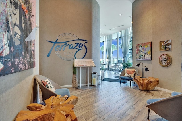 4111 S Ocean Dr Unit 1201, Hollywood, FL 33019 - common area featuring floor to ceiling windows and a towering ceiling