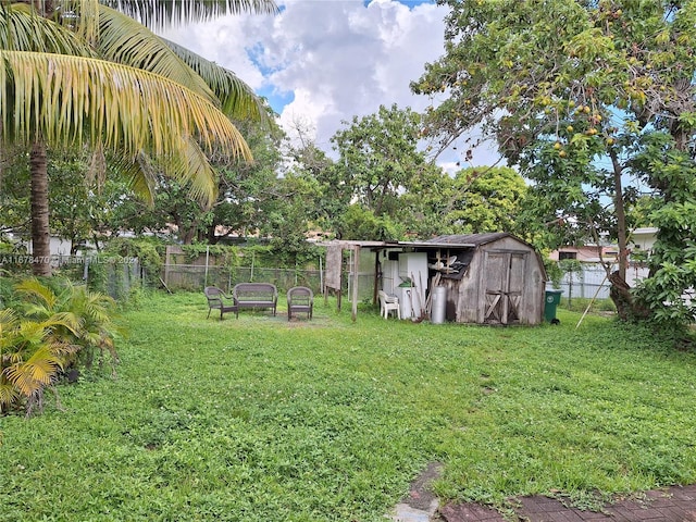 view of yard with a storage shed