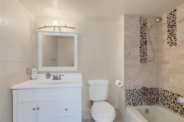 full bathroom with toilet, a textured ceiling, tiled shower / bath combo, and vanity