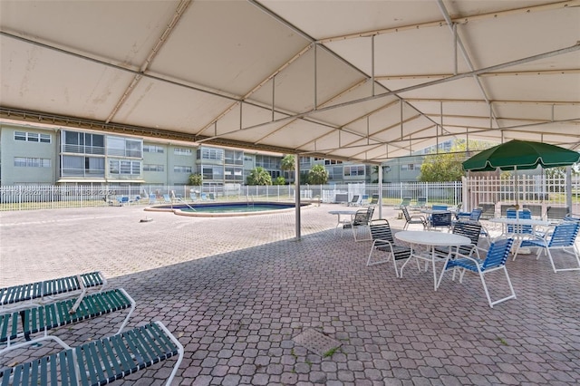 view of patio with a community pool