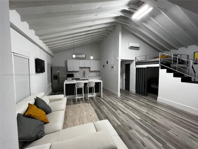 844 SW 8th Ave, Miami, FL 33130 - living room featuring a wall unit AC, hardwood / wood-style floors, high vaulted ceiling, beamed ceiling, and sink