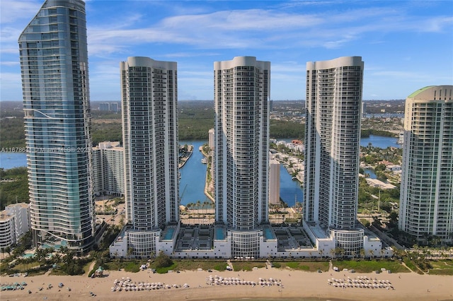 property's view of city featuring a water view