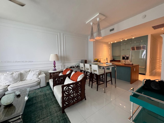 tiled living room with sink