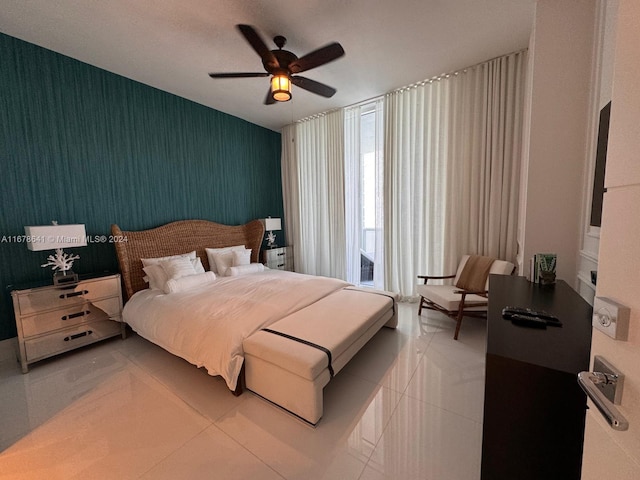 bedroom featuring ceiling fan and tile patterned flooring