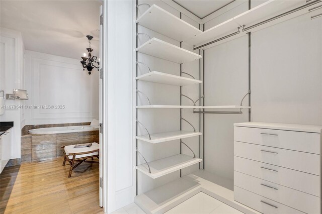 bedroom with access to exterior, light tile patterned floors, and ceiling fan