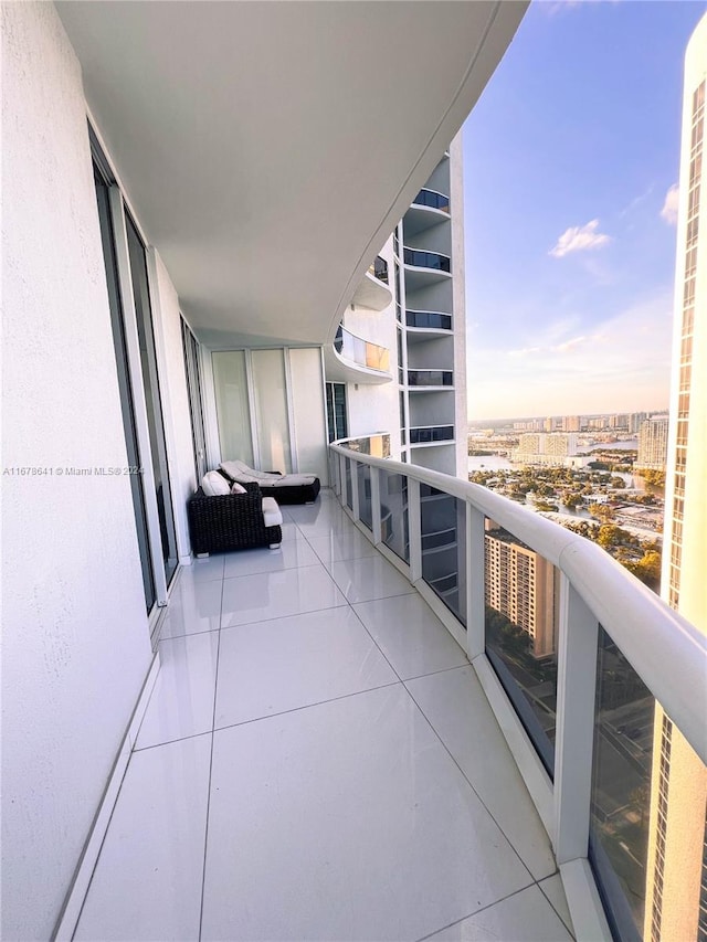 view of balcony at dusk