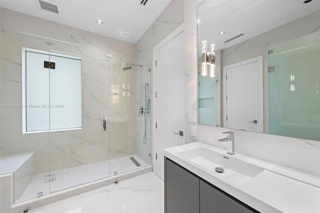 bathroom featuring vanity and walk in shower