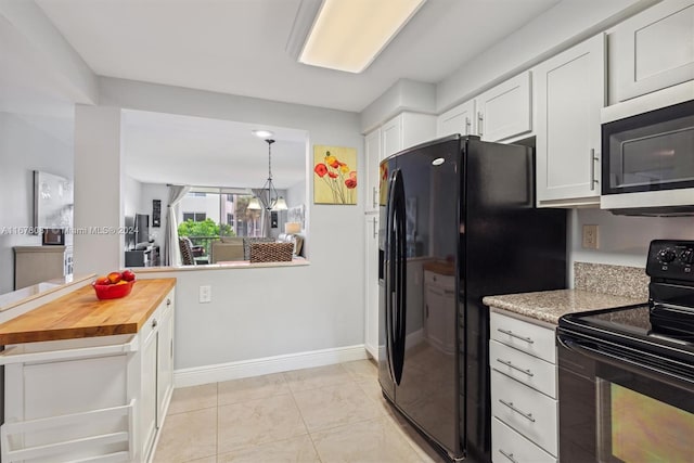 kitchen with white cabinetry, black appliances, a notable chandelier, wooden counters, and decorative light fixtures