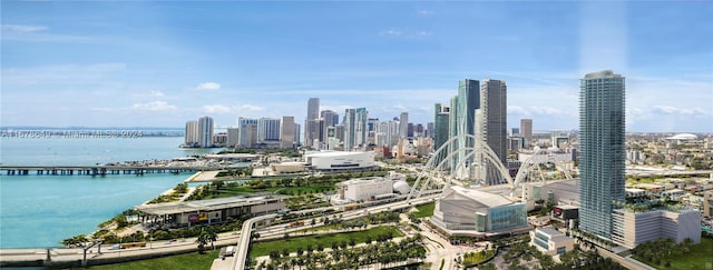 property's view of city with a water view