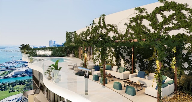 view of patio / terrace featuring a water view, a fenced in pool, and an outdoor hangout area