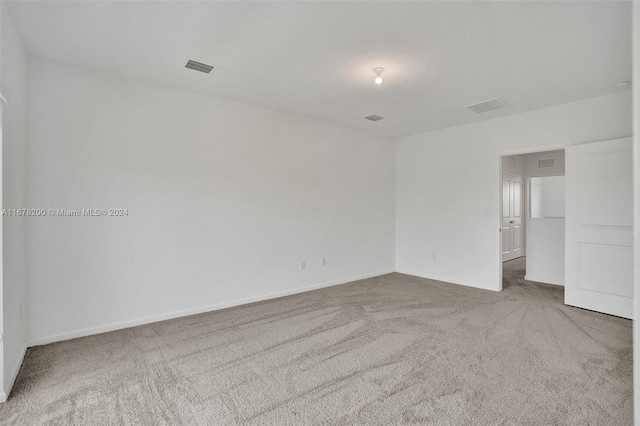 unfurnished room with carpet