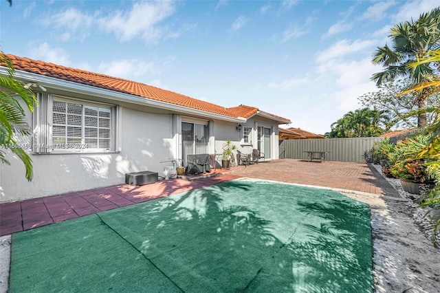 view of swimming pool featuring a patio area