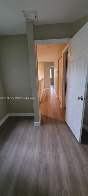 interior space with hardwood / wood-style flooring