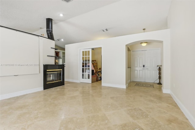 unfurnished living room with french doors