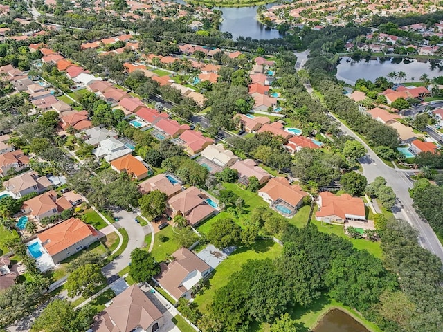 drone / aerial view with a water view