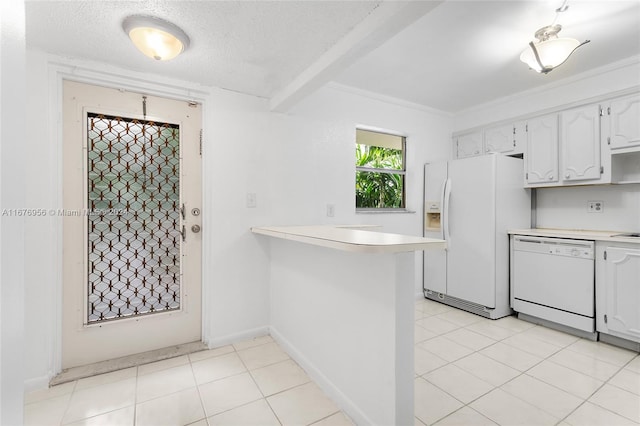 kitchen featuring white appliances, light tile patterned floors, kitchen peninsula, and white cabinets