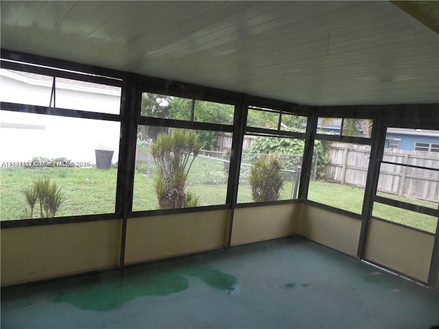 unfurnished sunroom featuring a healthy amount of sunlight