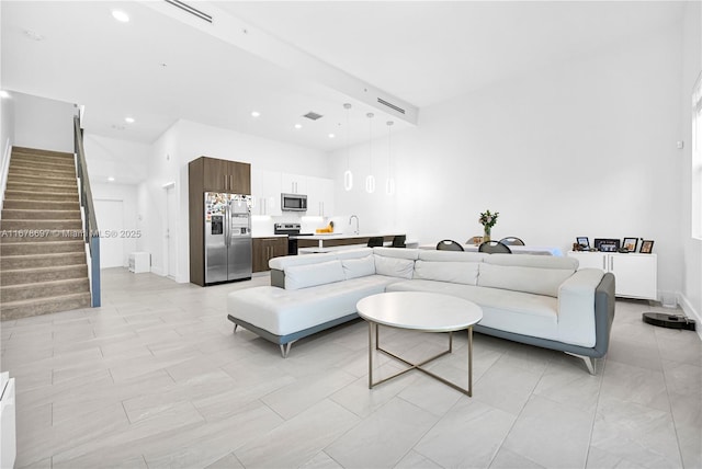 living room with light tile patterned flooring