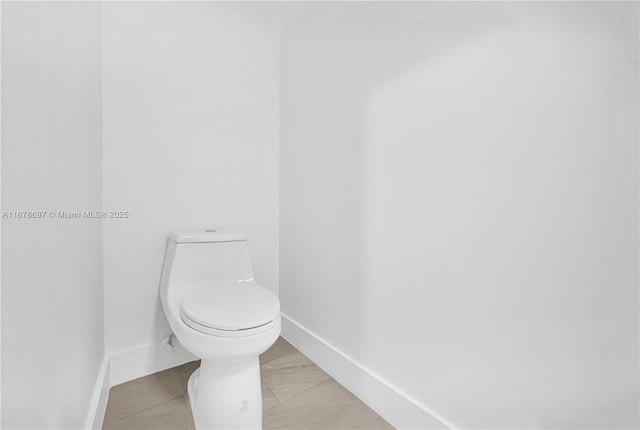 bathroom featuring toilet