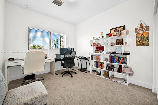 home office with light carpet