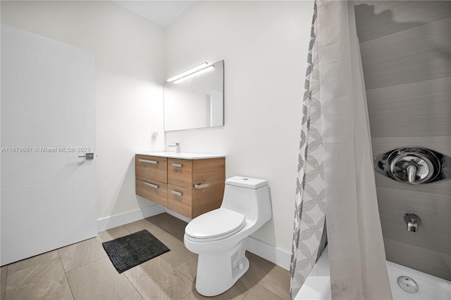 bathroom with tile patterned flooring, a shower with curtain, vanity, and toilet