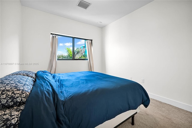 bedroom featuring carpet