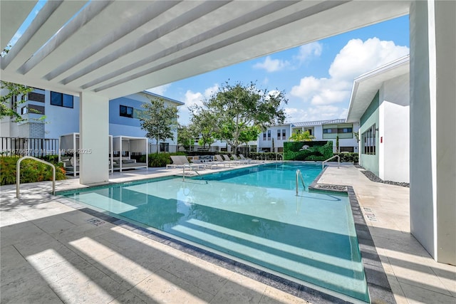 view of pool featuring a patio