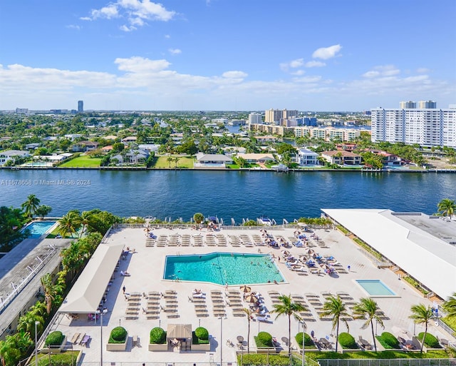 birds eye view of property featuring a water view