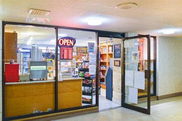 interior space featuring a textured ceiling