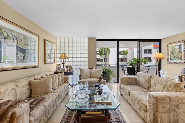 living room featuring floor to ceiling windows