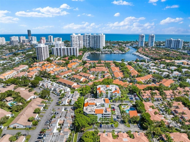 drone / aerial view with a water view