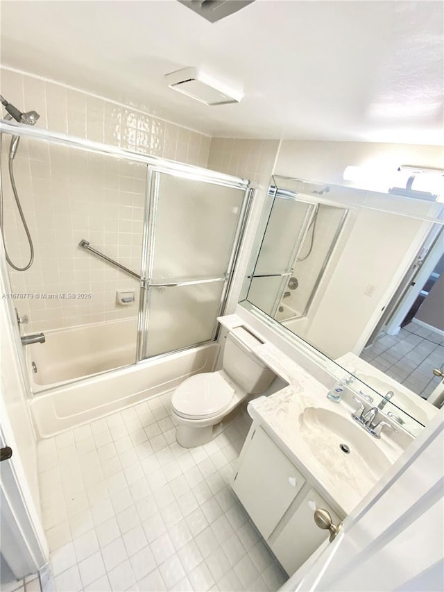 full bathroom with toilet, enclosed tub / shower combo, and vanity