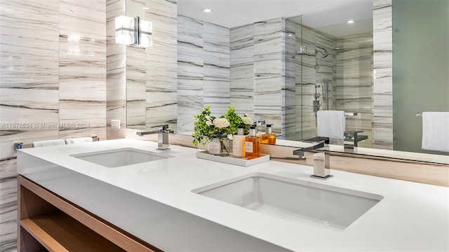 kitchen featuring tile walls and sink